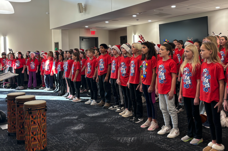 group of students in holiday hats